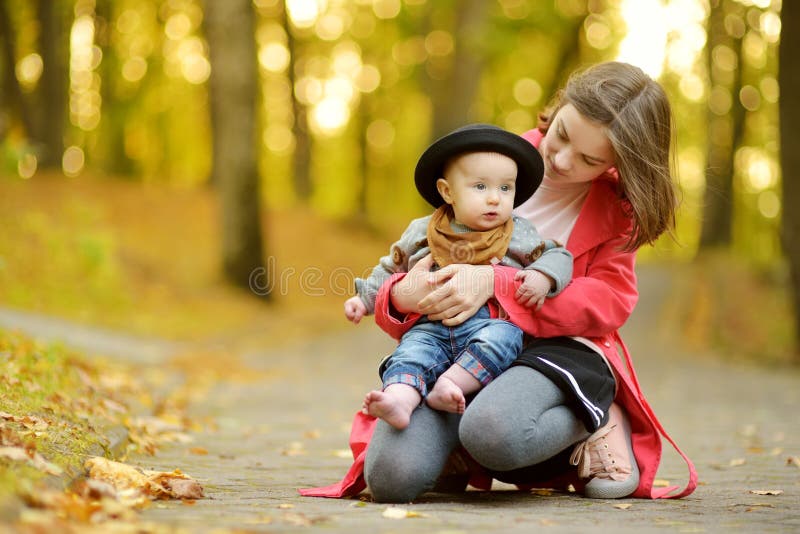 Cute Big Sister Cuddling With Her Baby Brother. Adorable Teenage Girl  Holding Her New Baby Boy Brother. Kids With Large Age Gap Stock Image -  Image Of City, Golden: 228522873
