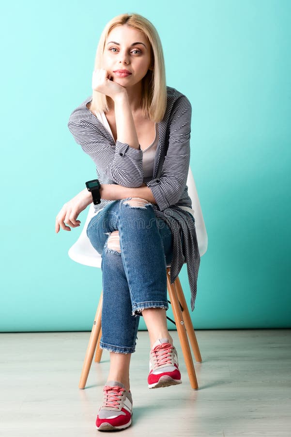 Cute blond girl is waiting for someone stock image Cute blond girl is waiting for someone stock image
