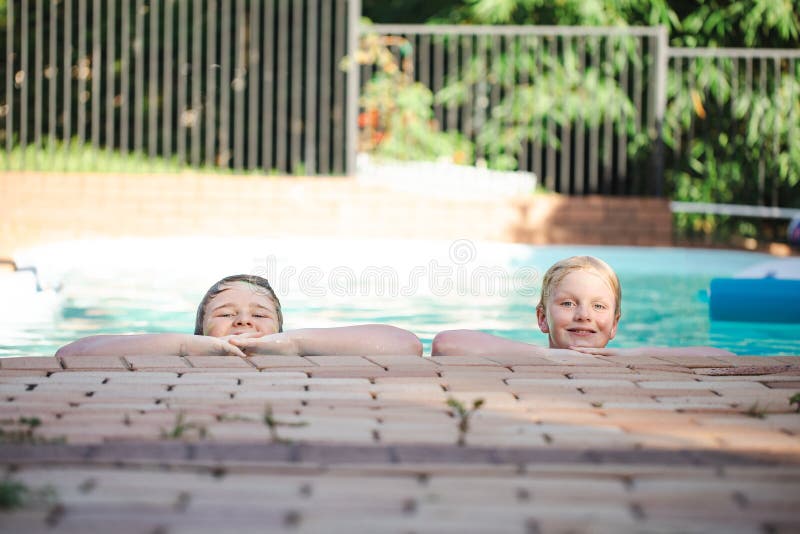 Cute Blonde Boys Swimming in Backyard Pool Stock Photo Image of