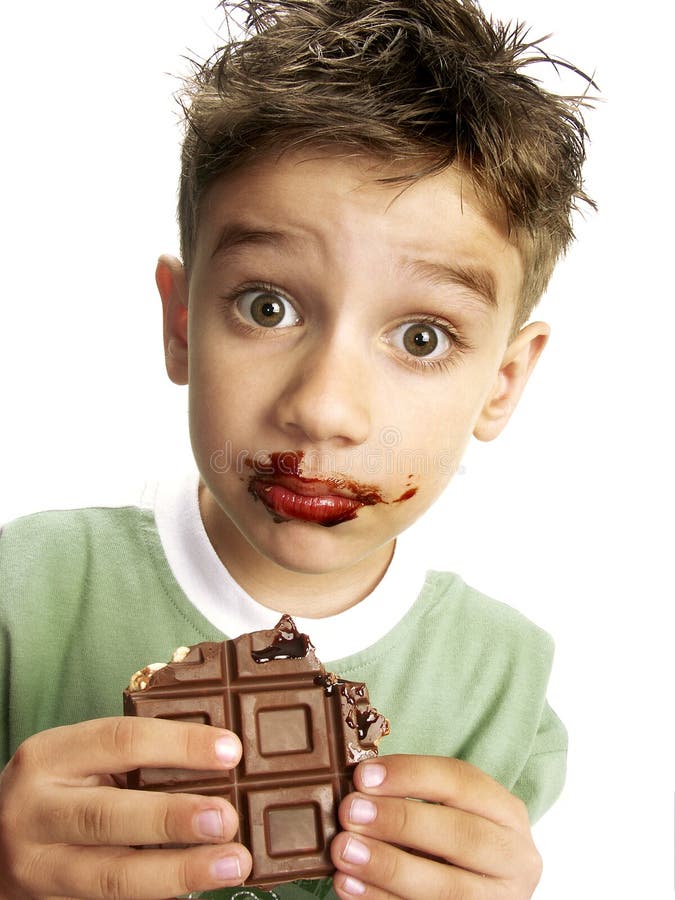 Cute Boy Eating Chocolate Stock Photos Image 16971583