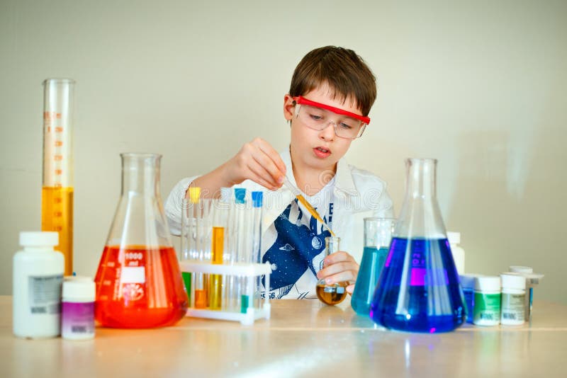 Cute Boy is Making Science Experiments in a Laboratory Stock Photo ...