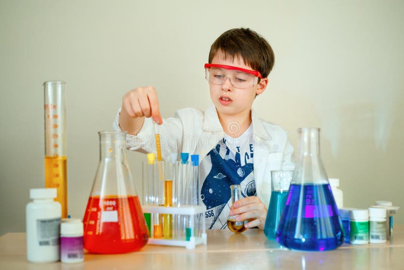 Cute Boy is Making Science Experiments in a Laboratory Stock Image ...