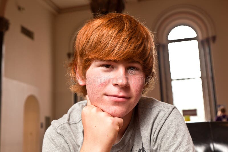 Cute boy with red hair