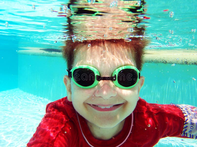 Cute boy swimming underwater royalty free stock image Cute boy swimming underwater royalty free stock image