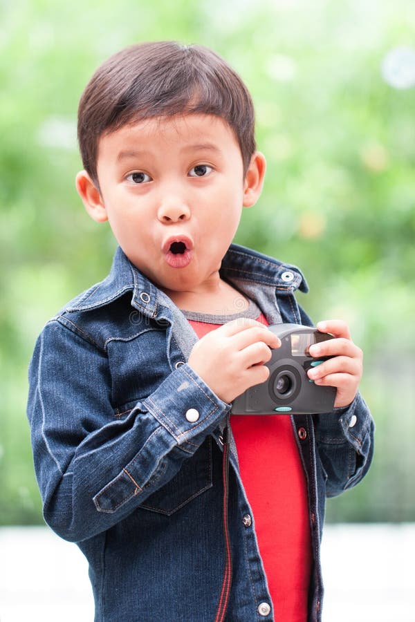 Cute Boy Using Compact Camera. Stock Photo - Image of person, film ...