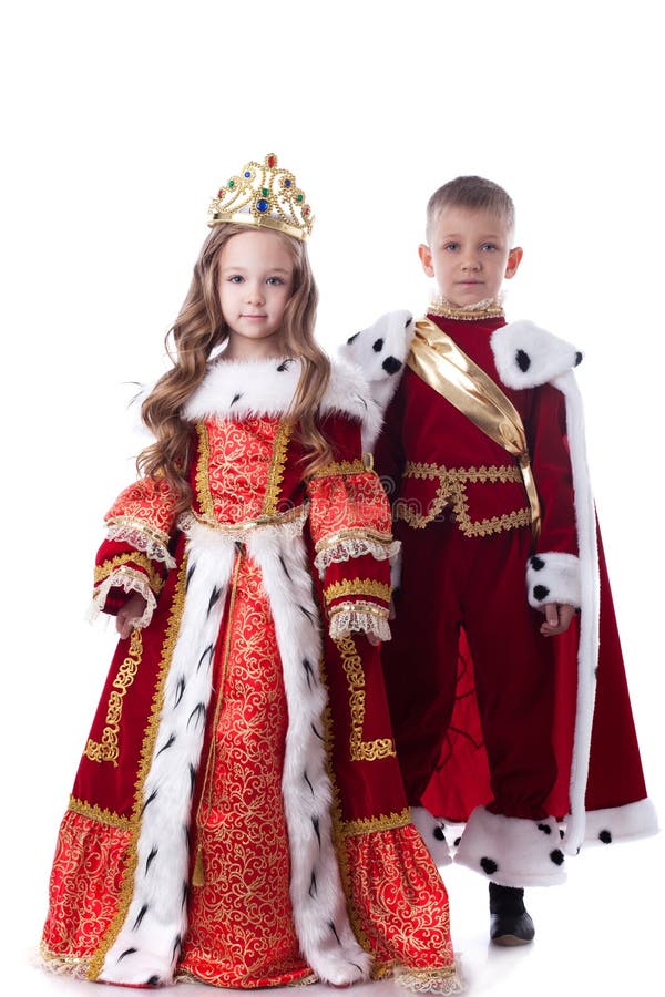 Cute brother and sister posing in royal attire