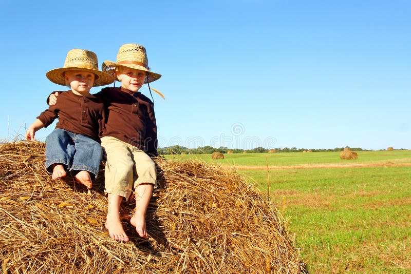 Cute Brothers Outside at Farm stock photos Cute Brothers Outside at Farm stock photos