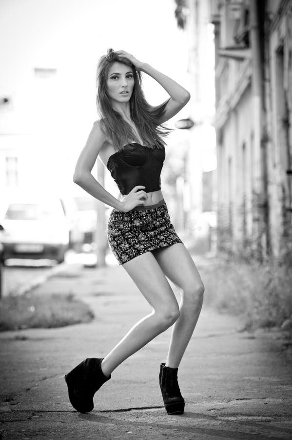 Cute Brunette With Short Skirt Posing On A City Street Stock Image Image Of Passion Evening