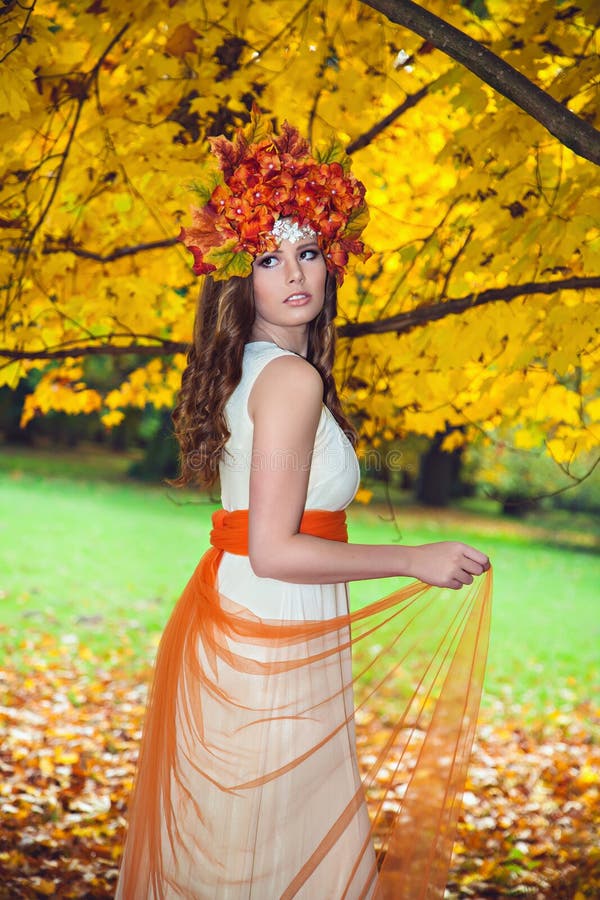 Cute Brunette Woman In Autumn Forest