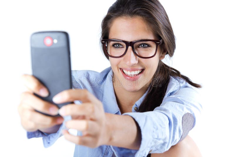 Cute brunette woman taking photo of herself