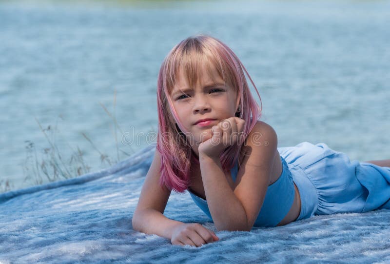 Cute Child Girl Portrait . Outdoor Portrait of Cute Little Girl in ...