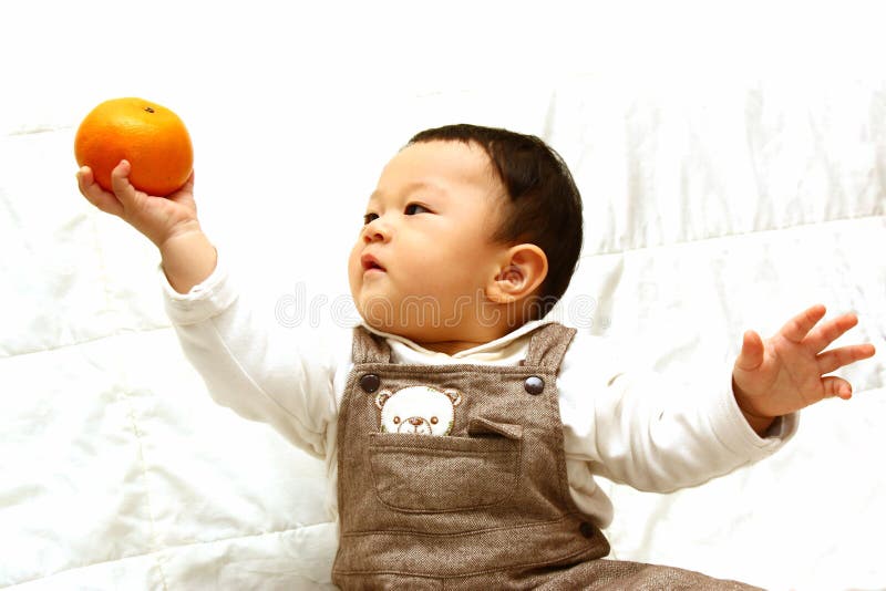 Cute Child with orange