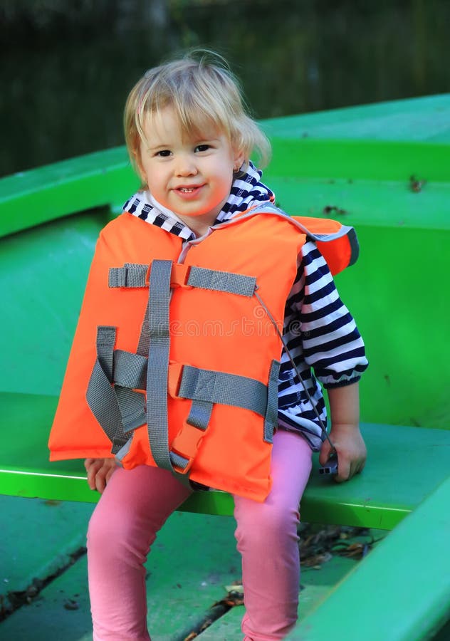 Cute Child Sit in Boat with Lifejacket Stock Photo Image of river