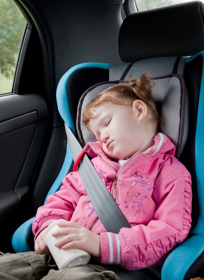 Boy Sleeping in Car stock image. Image of plaid, booster 71372751