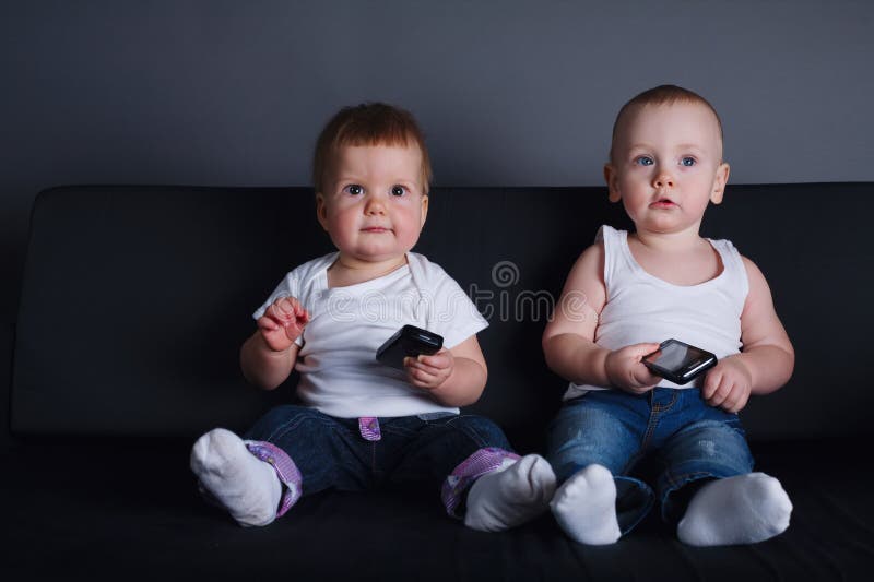 Cute children with mobile phones