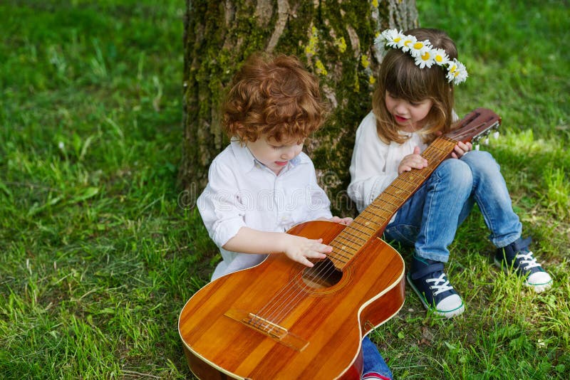 Cute Children Playing Guitar Stock Image Image of park, childhood