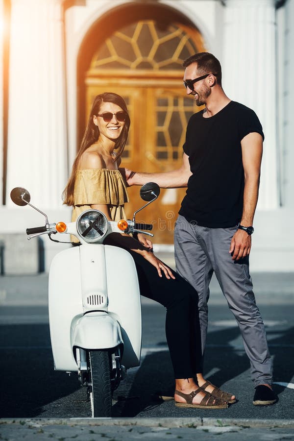 Cute Couple with Their Scooter Stock Photo - Image of lifestyle ...