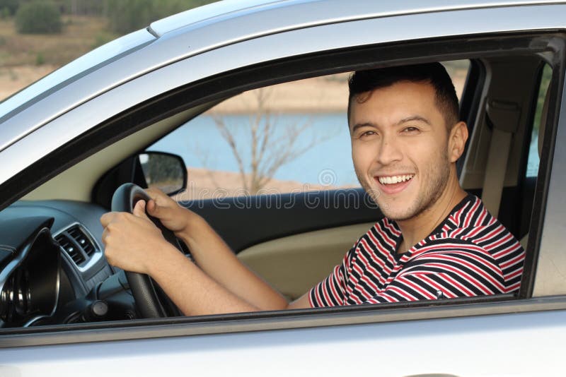Cute driver looking at camera stock photo