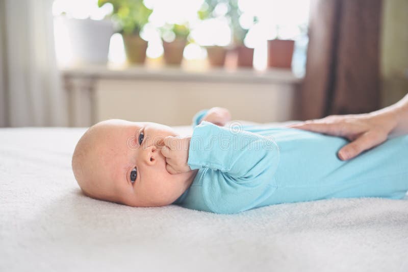 Cute Emotional Funny Newborn Infant Crying Boy Laying On Bed Infant Cute Emotional Funny Newborn Infant Crying Boy Laying On Bed Infant