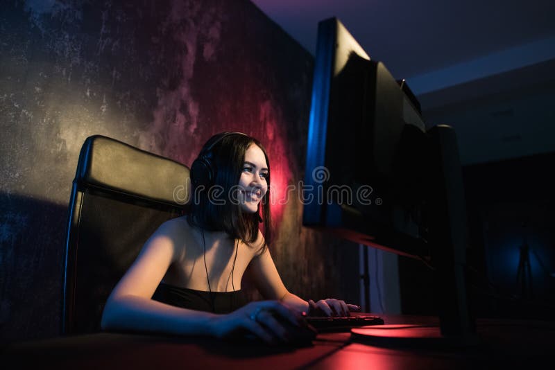 Gamer Girl Seating in Front of the Computer Playing Online Game, People  Stock Footage ft. adult & athome - Envato Elements