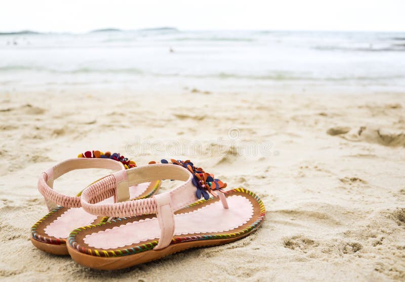 Cute Flip Flops At The Beach. Stock Photo - Image of flower, coast ...