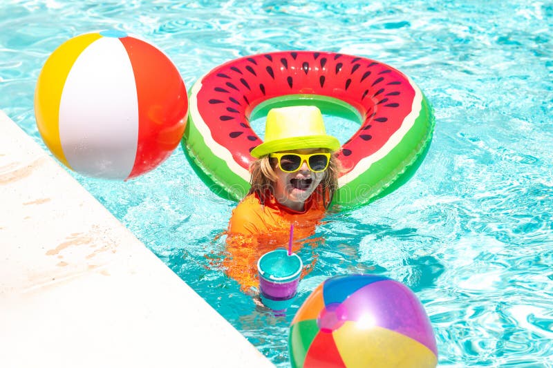 Cute Funny Child Boy Relaxing with Toy Swimming Ring in a Swim Pool ...