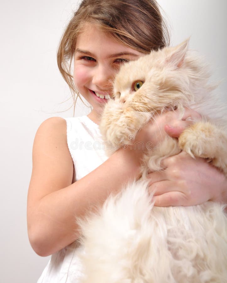 Cute girl with a cat royalty free stock images Cute girl with a cat royalty free stock images