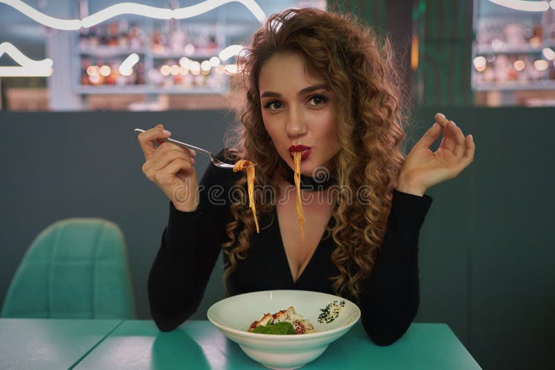 [Image: cute-girl-curly-hair-eating-pasta-restau...173710.jpg]