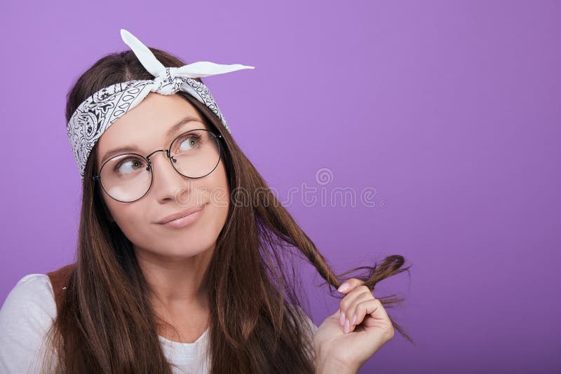 Funny brown-haired woman looks away, close-up royalty free stock image Funny brown-haired woman looks away, close-up royalty free stock image