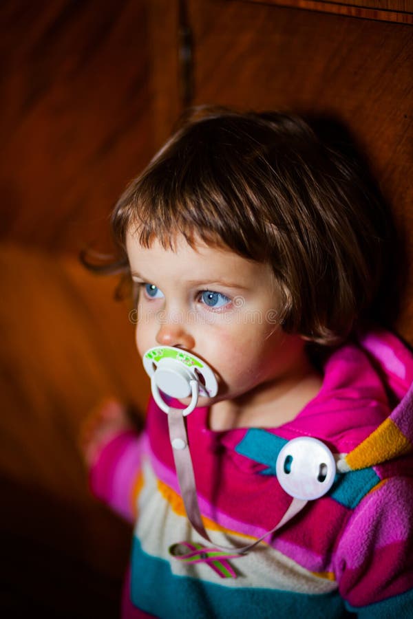 Cute girl with pacifier stock photo. Image of small, relaxed 40477026