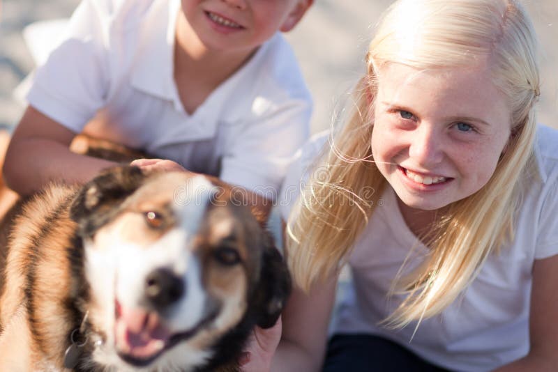 Cute Girl Playing with Her Dog Outside