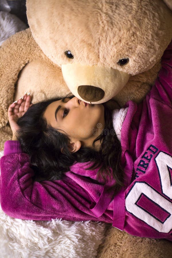 Cute Girl Posing with Teddy Bear Stock Image - Image of background