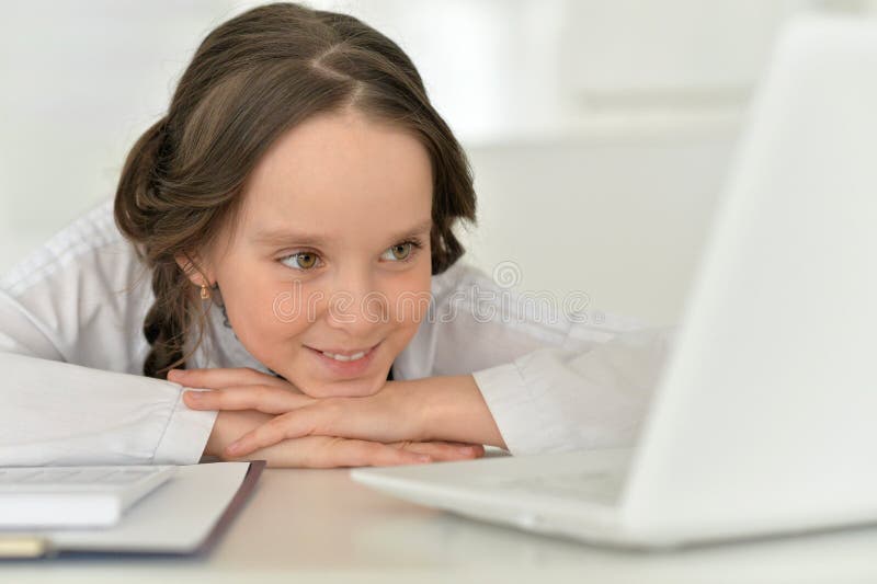 Girl On Laptop In Living Room