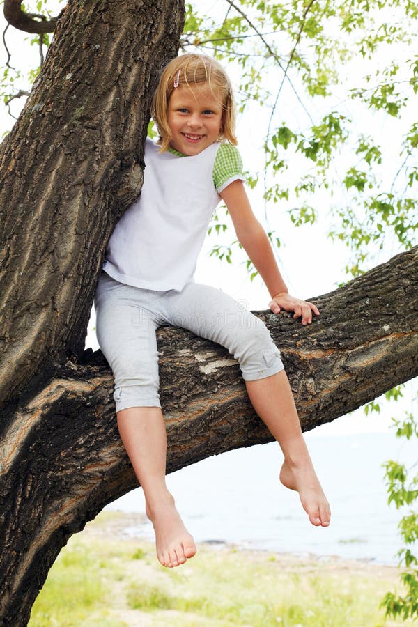 Cute Girl Sitting On A Tree In Summer Stock Image Image Of Female Lifestyle 38771997