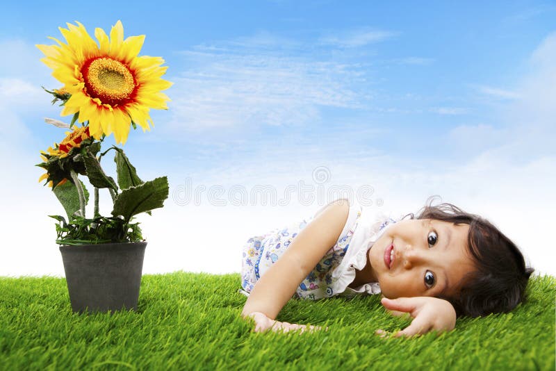 Cute girl with sunflower