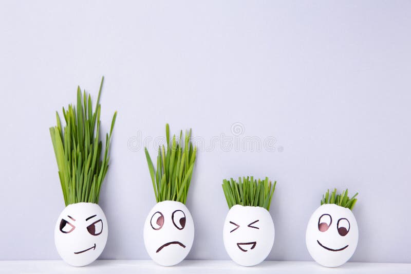 Cute Handmade Eggs with Hair of Green Grass with Copy Space. Easter on Grey Background Stock Photo - Image of emotion, copy: 173618496