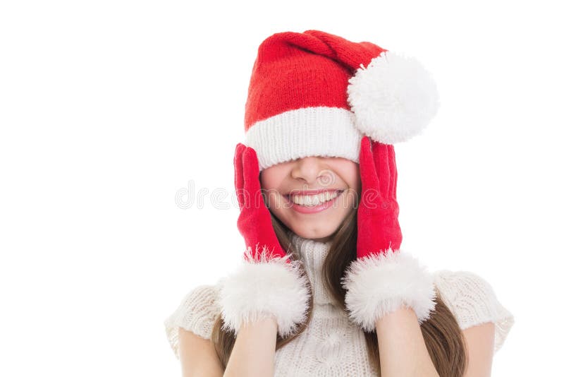 Cute happy teenage girl with big Santa hat