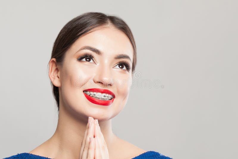 Cute Happy Woman with Braces on Teeth Looking Up Stock Image Image of