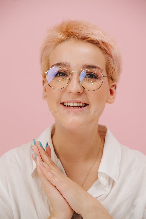 Cute Happy Young Woman with Short Blond Hair, Round Glasses and Stars ...