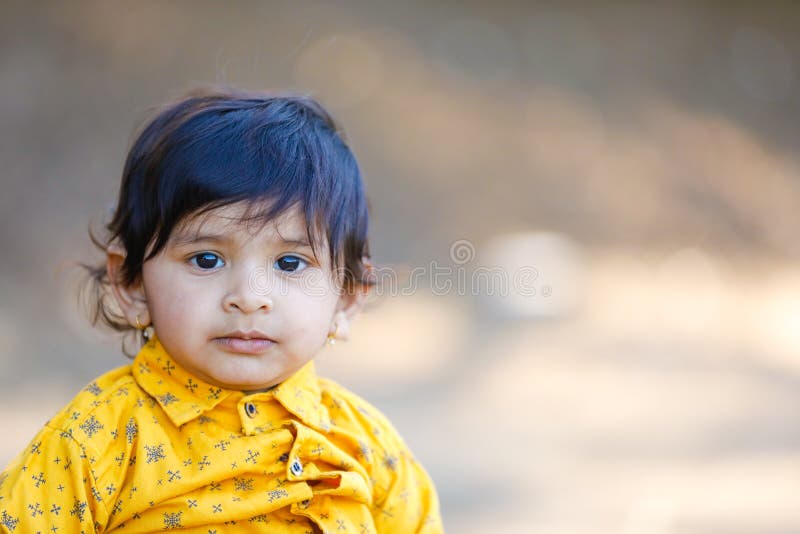 Cute Indian Baby boy stock image. Image of closeup, green 150325357