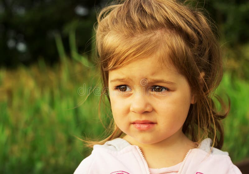 Cute kid thinking outdoor stock photography Cute kid thinking outdoor stock photography