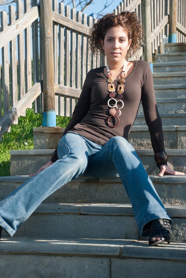 Cute Lady in Casual Clothes Sitting on Stairs Stock Photo - Image of ...