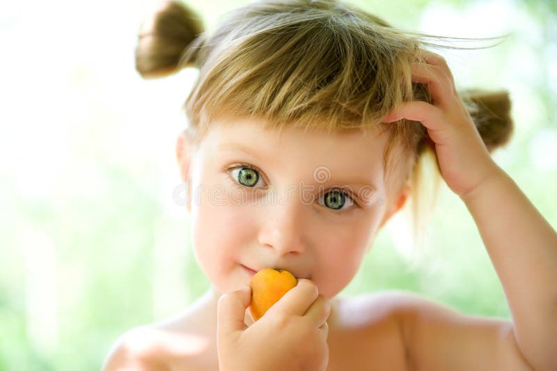 Cute liitle girl with the apricot