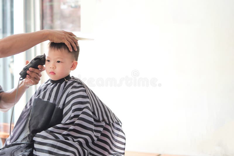 Cute Little Asian Boy Child Getting a Haircut at the Hairdresser`s Barber Shop, Kid Cut with Hairdresser`s Machine Stock Photo - Image of battalion, korean: 191252862 Cute Little Asian Boy Child Getting a Haircut at the Hairdresser`s Barber Shop, Kid Cut with Hairdresser`s Machine Stock Photo - Image of battalion, korean: 191252862