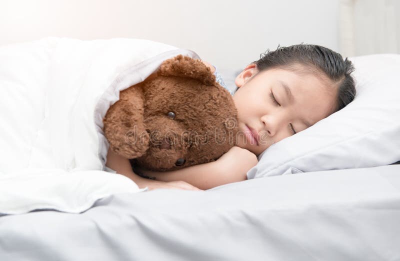 Cute Little Asian Girl Sleep And Hug Teddy Bear Stock Photo Image Of