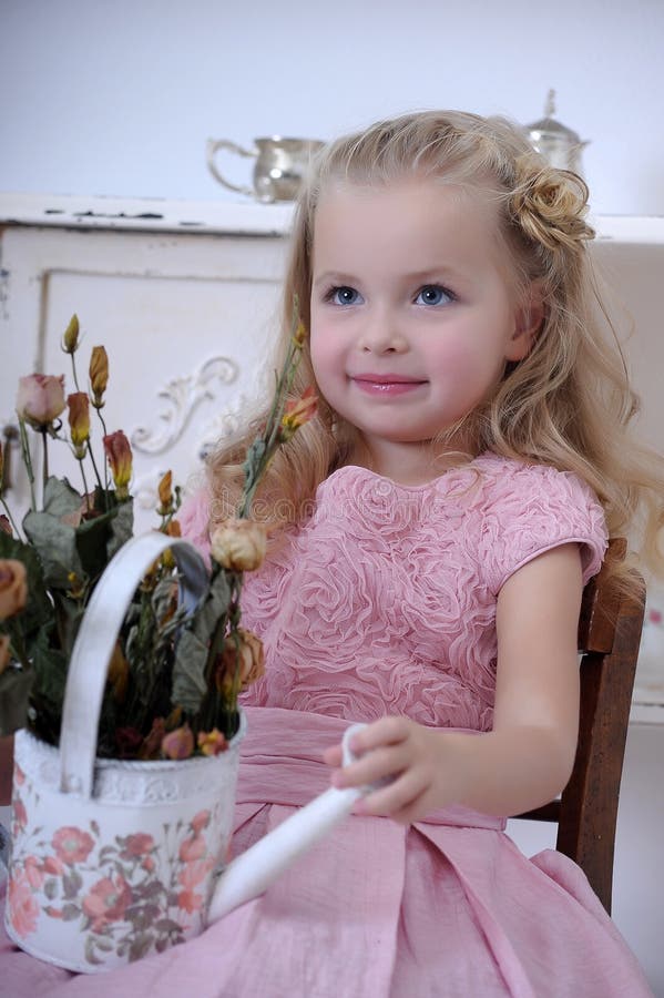 Cute Little Blonde Girl In A Pink Dress With Curls Stock Image Image Of Curls Caucasian 