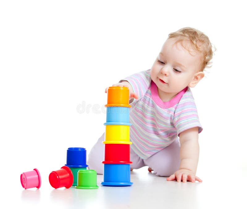 Cute little boy building tower