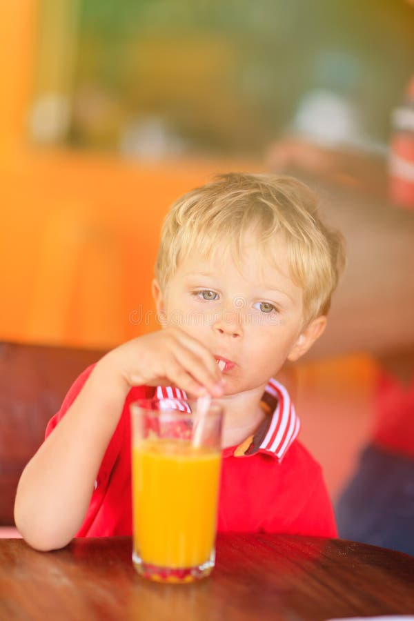 Cute Little Boy Drinking Juice in Cafe Stock Image Image of cheerful