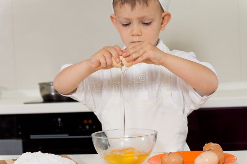 Cute Little Boy Learning To Bake a Cake Stock Image Image of child, household 41392353