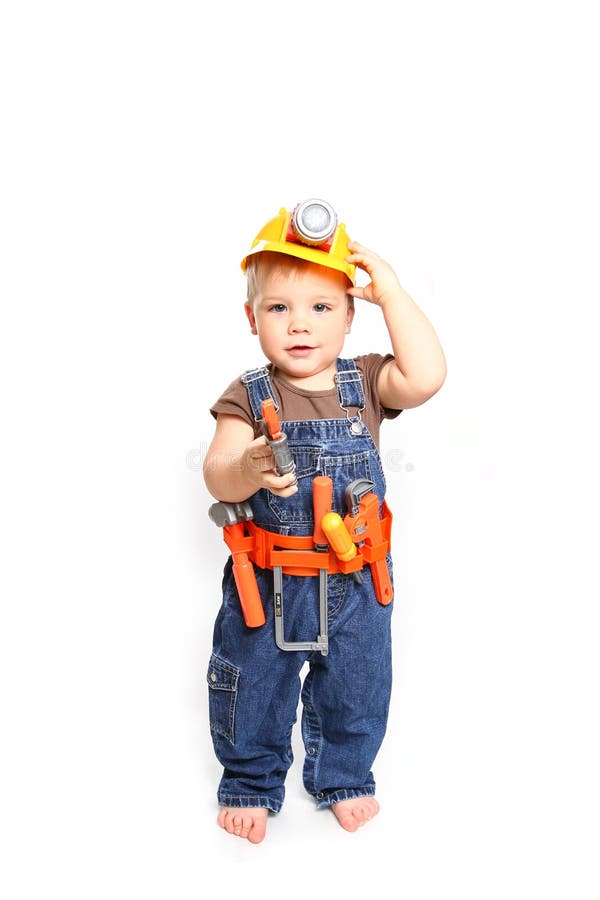 Cute little boy in an orange helmet and tools on a white background